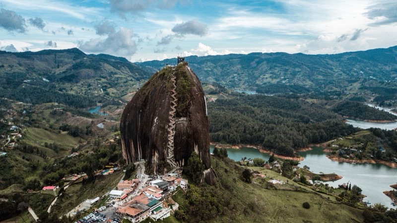 The granite dome of La Piedra del Peñol with its zigzag staircase, above the islands and inlets of the Peñol-Guatapé reservoir